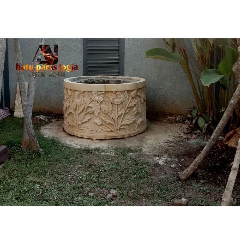 batu ukir motif  daun angrek untuk pot besar