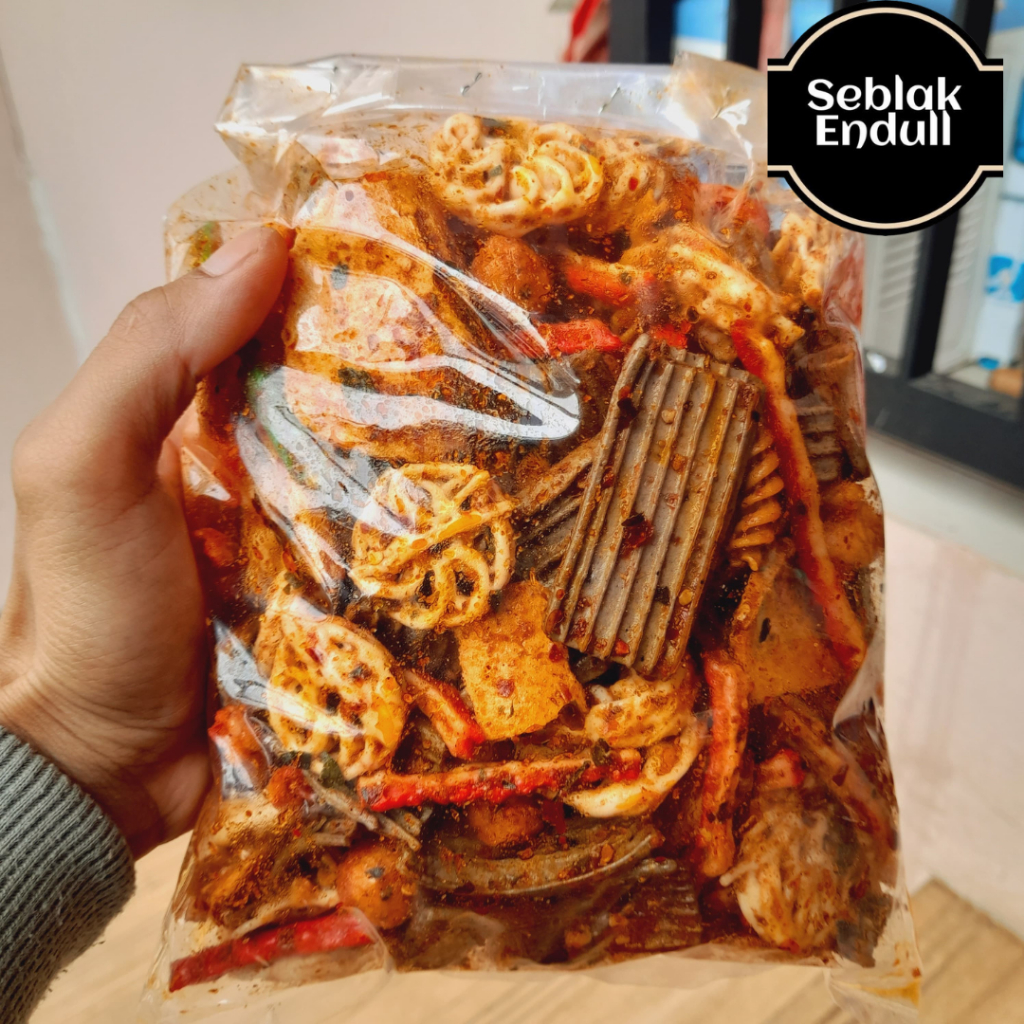 

KRUPUK SEBLAK CAMPUR/MiX JENGKOL/PEDO/BETON/BASRENG/KRIPIKKACA BUMBU CIKRUH PEDAS DAUN JERUK 500grm