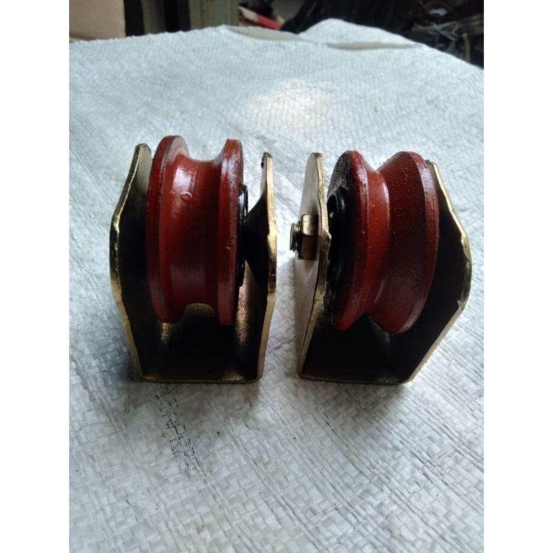 roda pagar cor medan besi gerbang ukuran 6cm /bentuk siku dan bulat/warna oren pleting