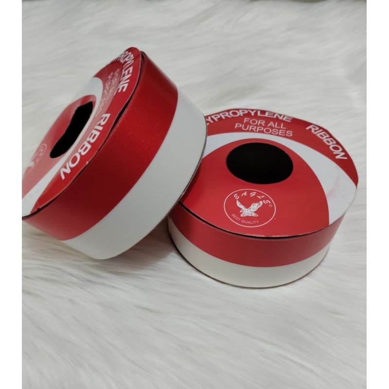 

PITA KADO MERAH PUTIH UKURAN 3 INCH DAN 1½ INCH