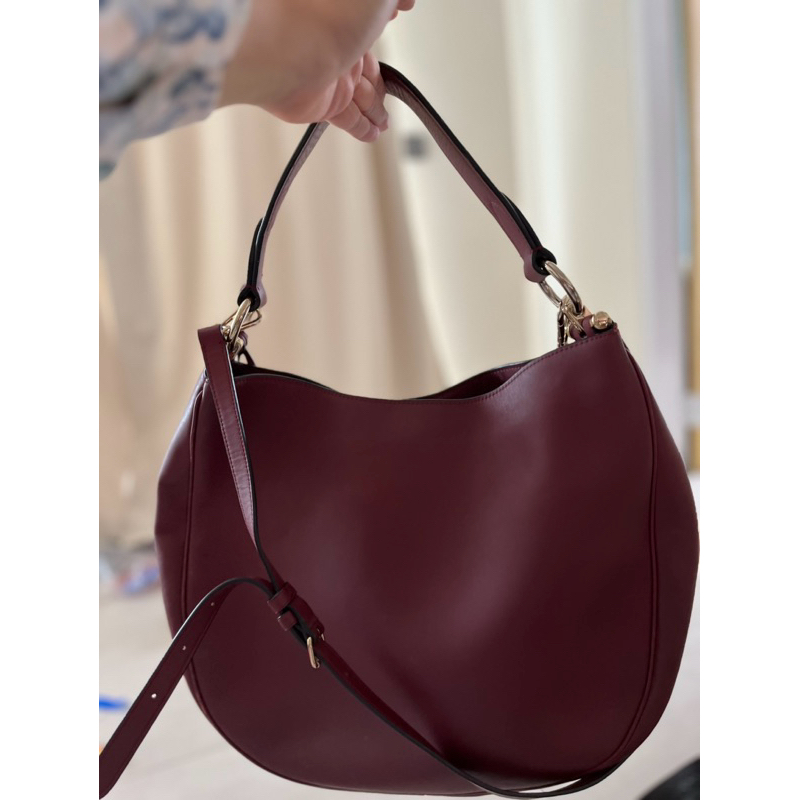 Coach Nomad Hobo Bag (preloved) in burgundy