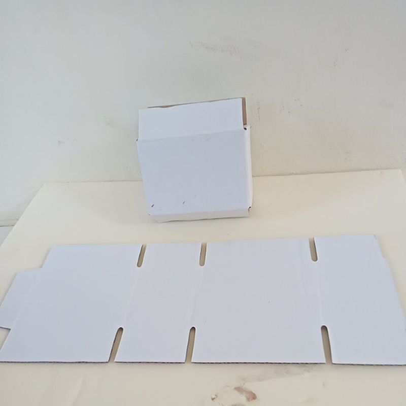 

Dus single B flute white Kraft 10×6×7cm