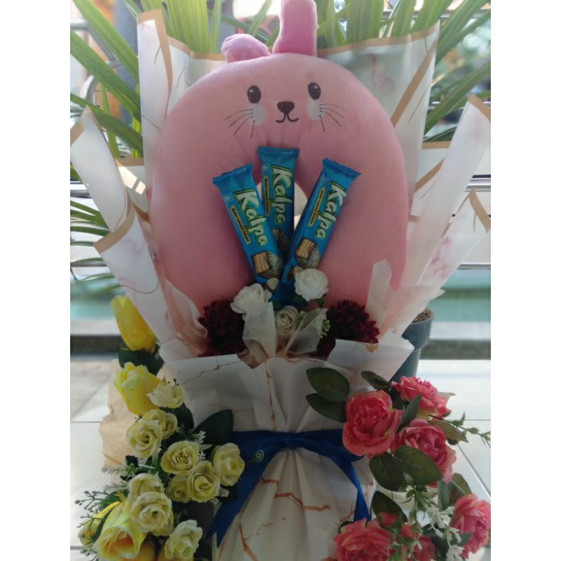 

bucket boneka dan jajan