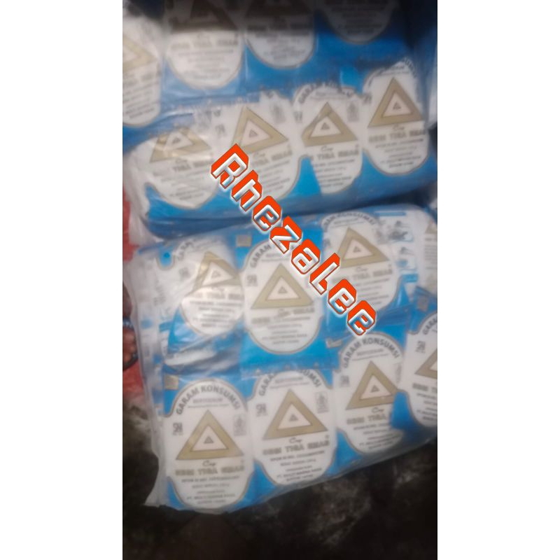 

Garam segitiga emas 250gr(1bal isi 40bks)