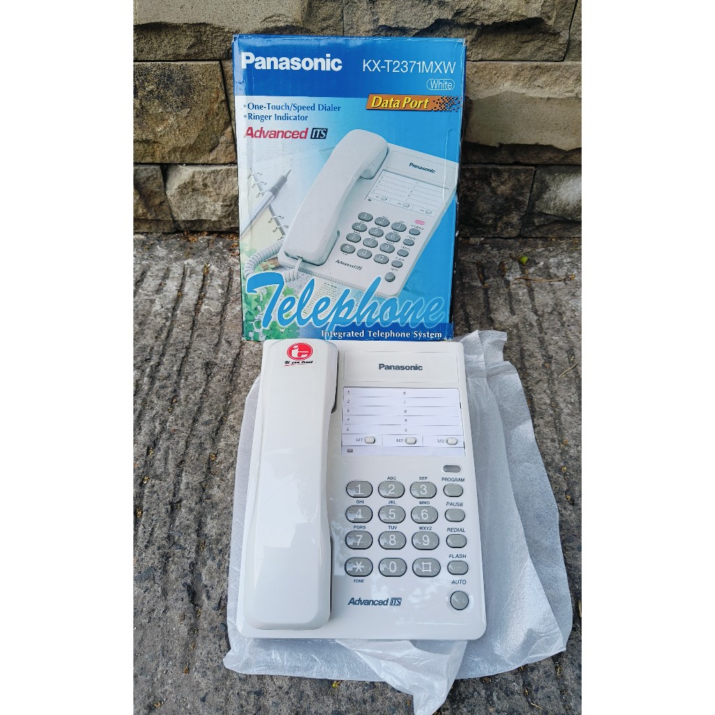 Pesawat telepon rumah dan kantor panasonic KX T2371 MXW putih