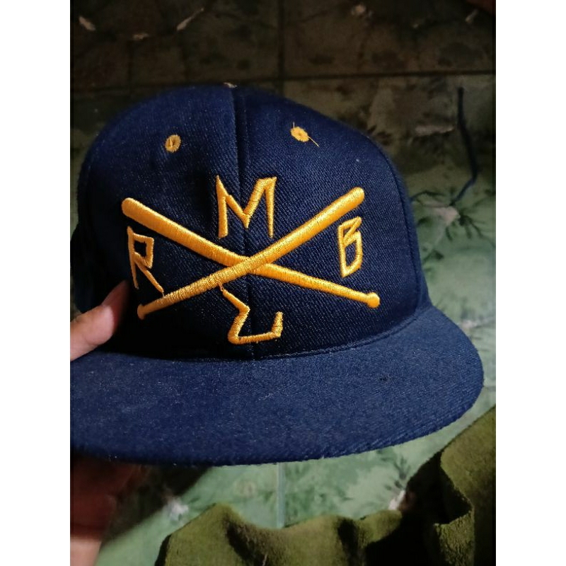 TOPI RMBL