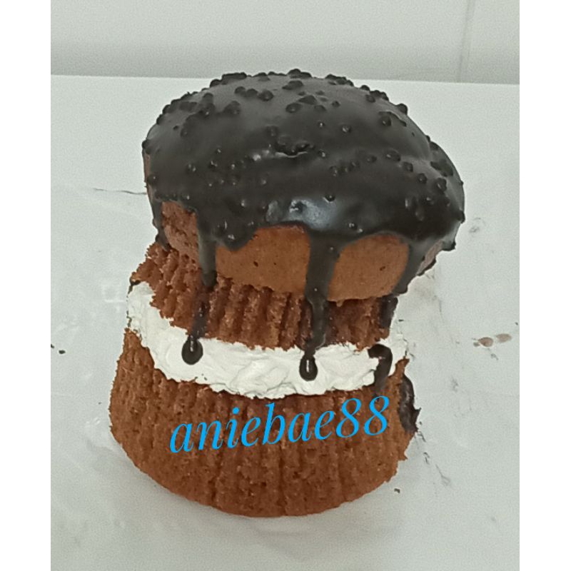 

Kue bolu blackforest krim atas coklat siram