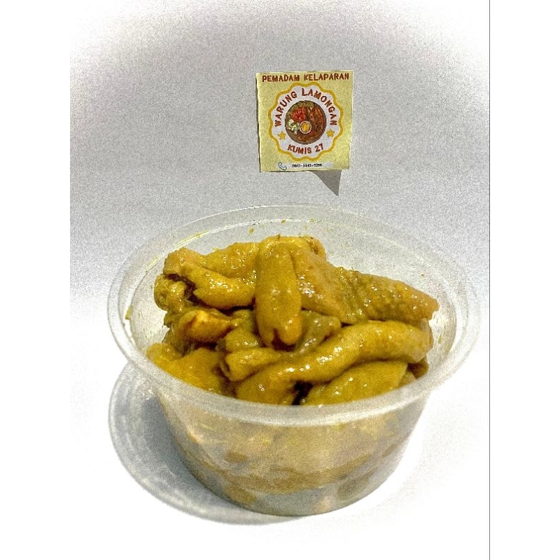 

Kulit Ayam Ungkep Bumbu Kuning 200 gram gratis sambel gower siap goreng