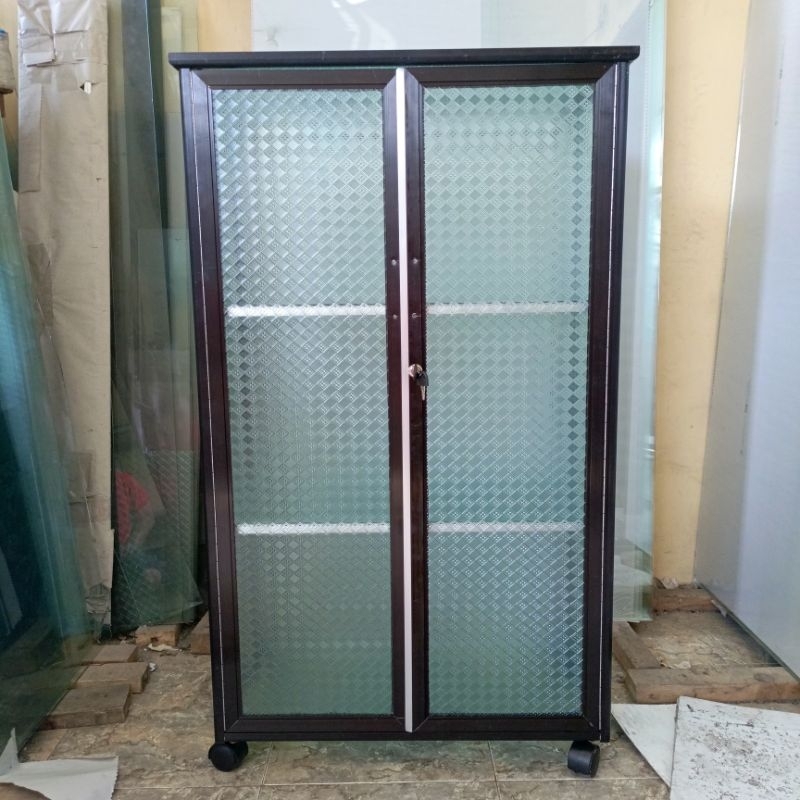 Lemari mukena tinggi 120 cm 3 ruang