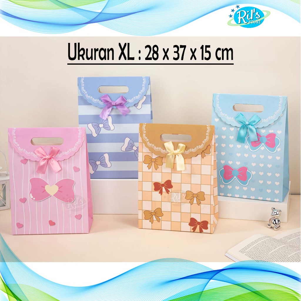 

PAPERBAG GLOSSY PREMIUM XL 28x15x37 CM - PAPERBAG PARTY POND - KADO - XL - PITA POND BAGUS