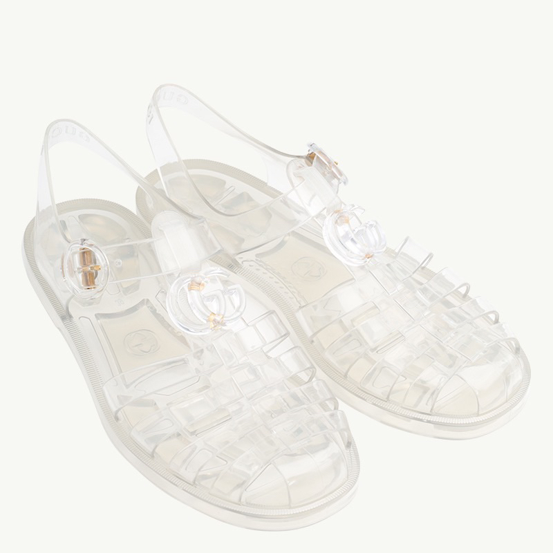 GUCCI Women GG Ankle Buckle Flat Sandals in Transparent Rubber