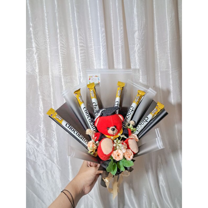 

Buket Boneka Wisuda Mini Snack Chocolatos