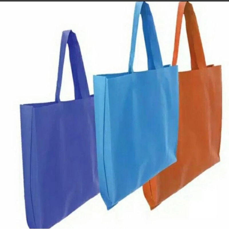 

Tas spunbond handle Goodie bag ukuran 38x45 isi 12pcs