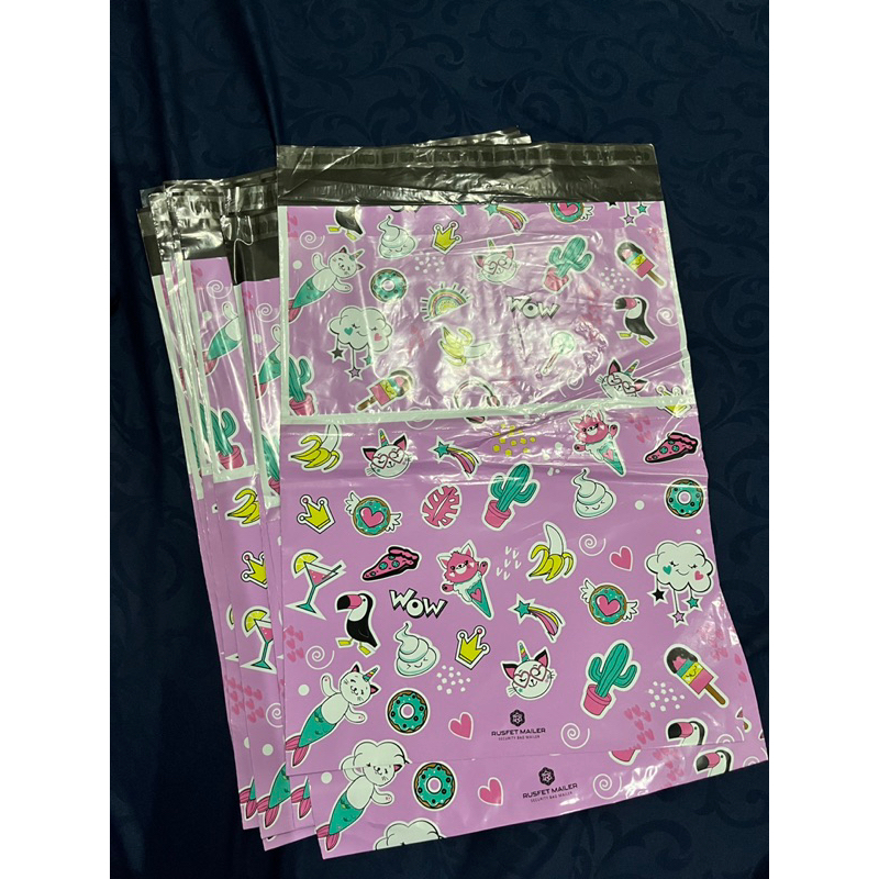 

plastik polymailer polos dan motif size 30x40cm