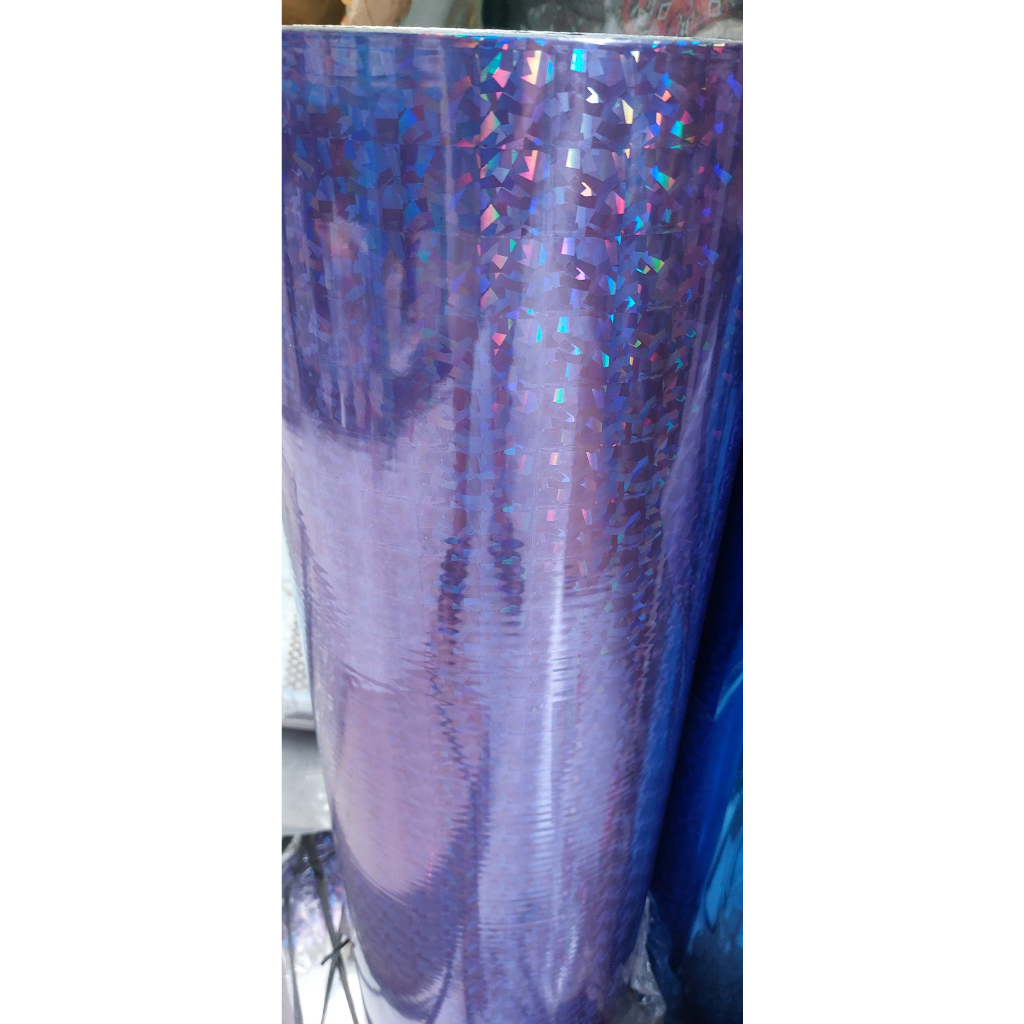 

Plastik Kado Hologram Ungu Pasir Roll Wrapping Paper Lebar 65cm - 1 Roll Berat 2 Ons