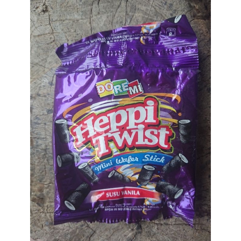 

SNACK JADUL DOREMI HEPPY TWIST ASTOR RENCENG 10pcs BERHADIAH COKLAT VANILA