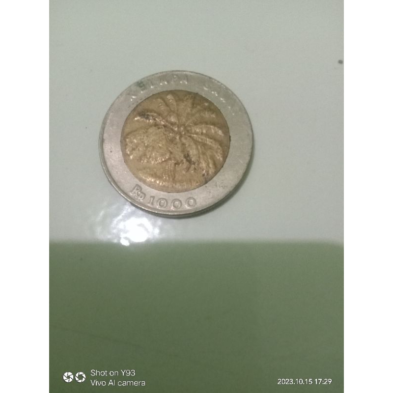 uang koin 100 kelapa sawit tahun 1996