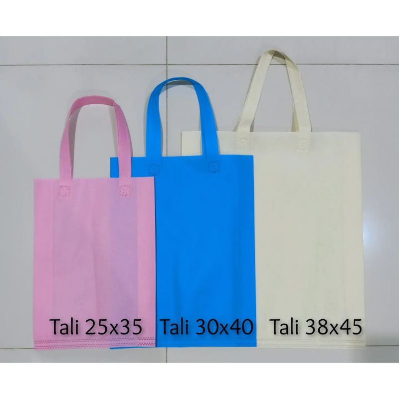 TAS SPUNBOND UKURAN 38*45*12 LIPATAN SAMPING + FREE SABLON 1 HARI BERES