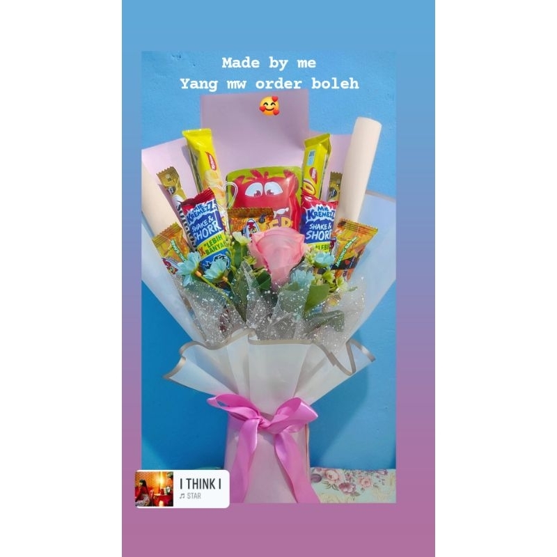 

bucket bunga dan cemilan