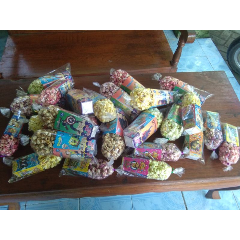 

POPCORN KEMASAN KERTAS KARTUN 12x6 isi 10