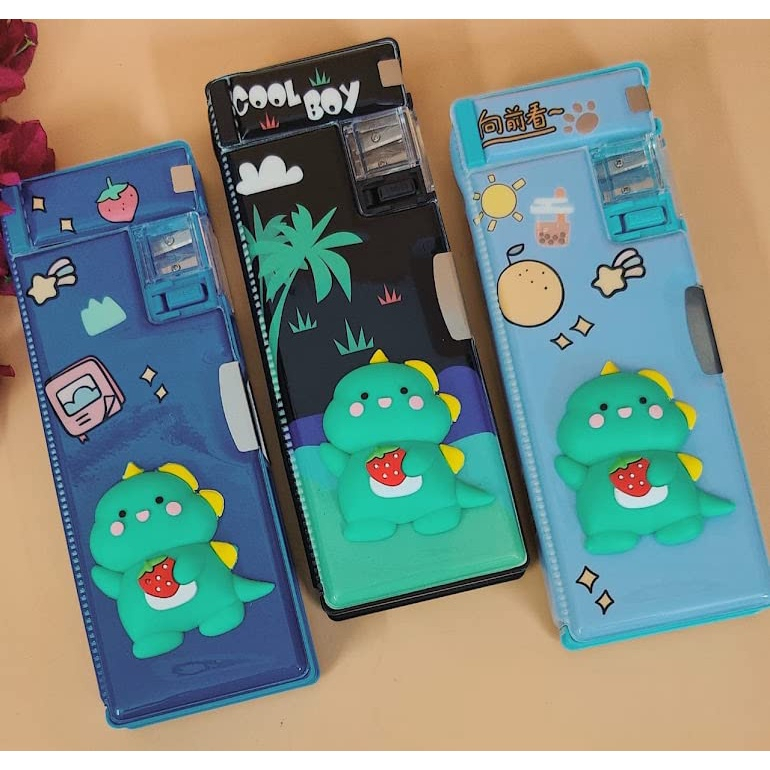 

PENCIL CASE KOTAK PENSIL / ANAK SEKOLAH GAMBAR DINO DINOSAURUS TIMBUL LUCU XPM 551-3