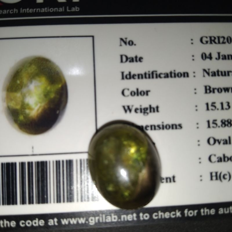 natural green star sapphire corundum. plus memo