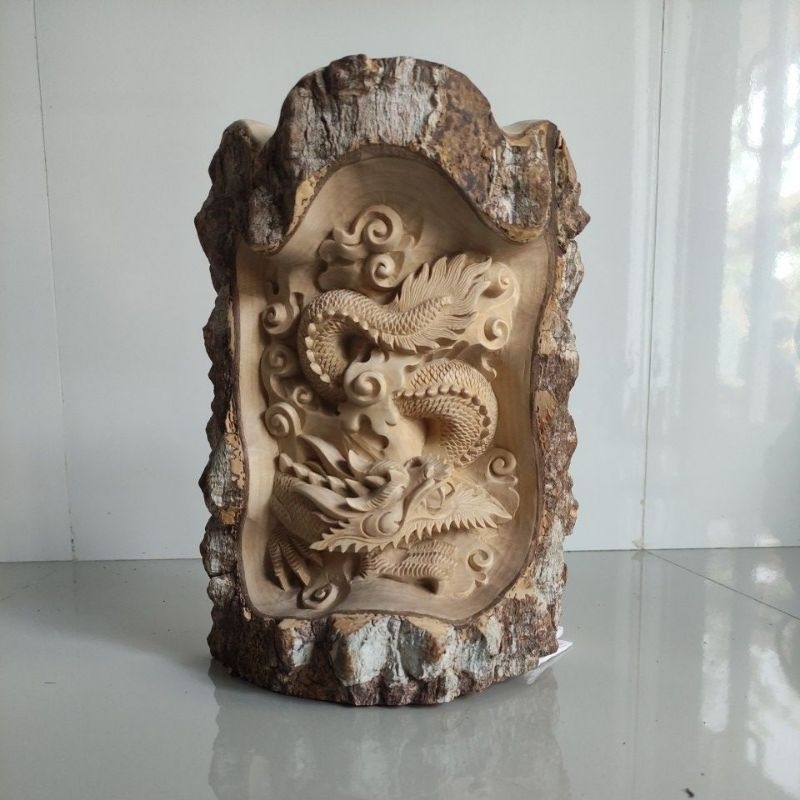 RELIEF UKIRAN NAGA BAHAN KAYU