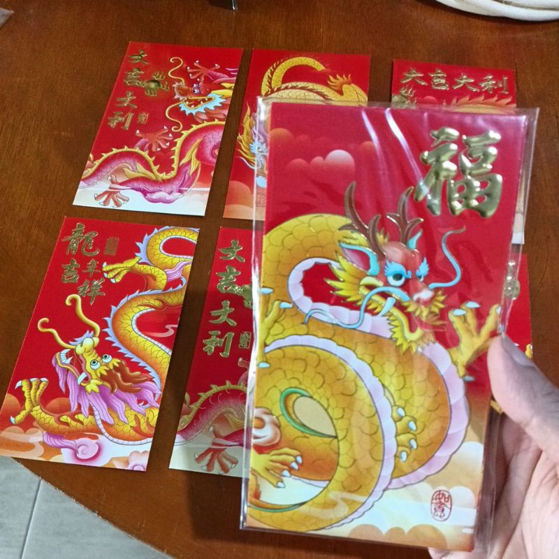 

Angpao Imlek panjang gambar shio baru 9 x 16.5 cm 1 bungkus isi 6 pc