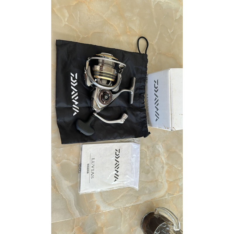 reel daiwa luvias batik 3012 like new