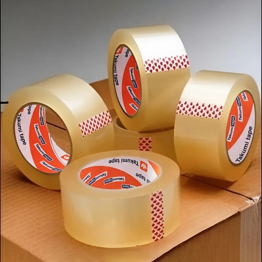 

TERMURAH !!! Lakban Tape Putih Bening Besar Lebar 45mm x 100 yard Tebal Kuat Lengket dan Tidak Mudah Putus