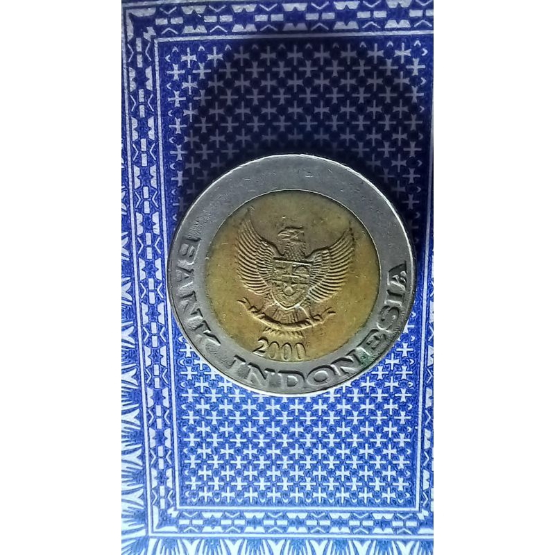 uang koin 1000 kelapa sawit