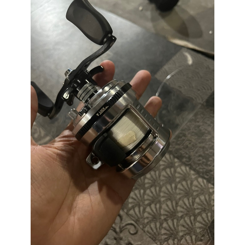 REEL SABRE DX 101 + line berkley nanofil 4lb