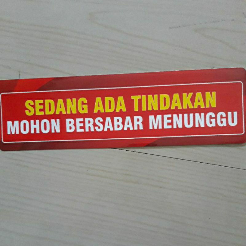 

Stiker Sedang Ada Tindakan Mohon Bersabar Menunggu