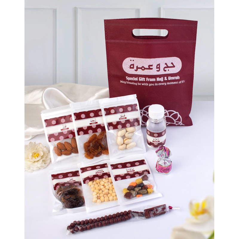 

Paket Kamil Merah Maron souvenir oleh oleh haji dan umroh lengkap dengan tas premium mewah malang grosir lusinan