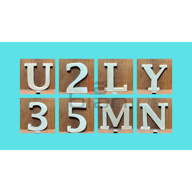 Huruf Timbul Costum Kayu