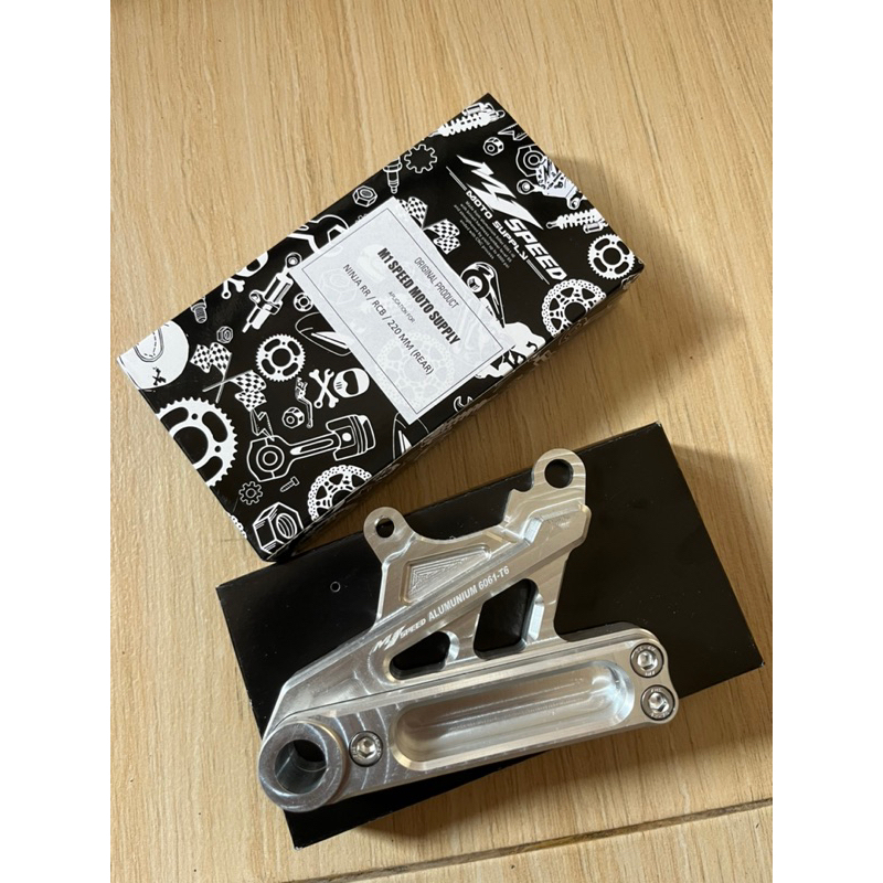 BREKET KALIPER NISSIN 2P ARM RR DISC 220 M1SPEED