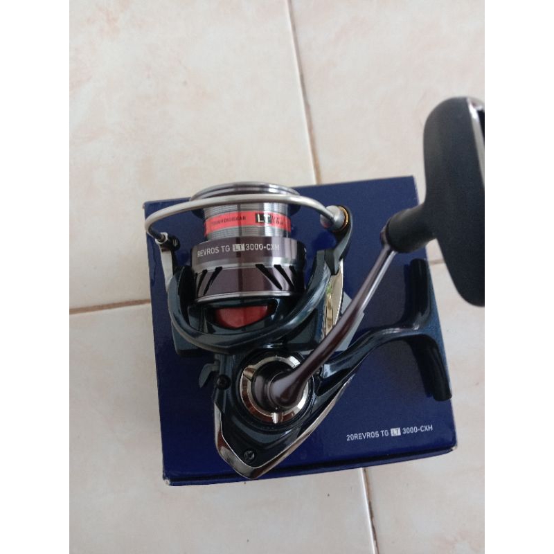 reel daiwa revros second/bekas