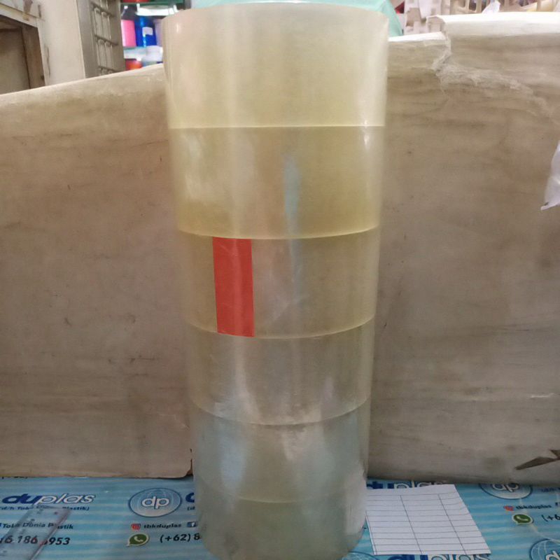 

Lakban Bening 2 inch 100 Yard Delman isi 6 pcs