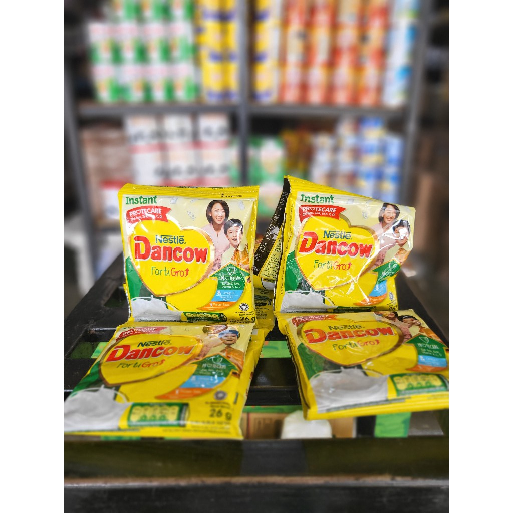 

Susu Bubuk Dancow Fortigrow Sachet 1 renteng 26 gr isi 10