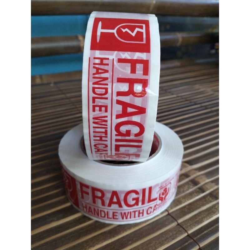 

Lakban fragile 140 meter merah putih jangan di banting