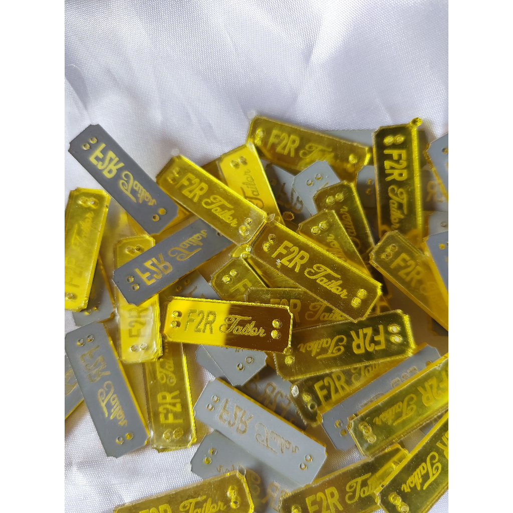 

Label Akrilik Label Hijab Label Baju
