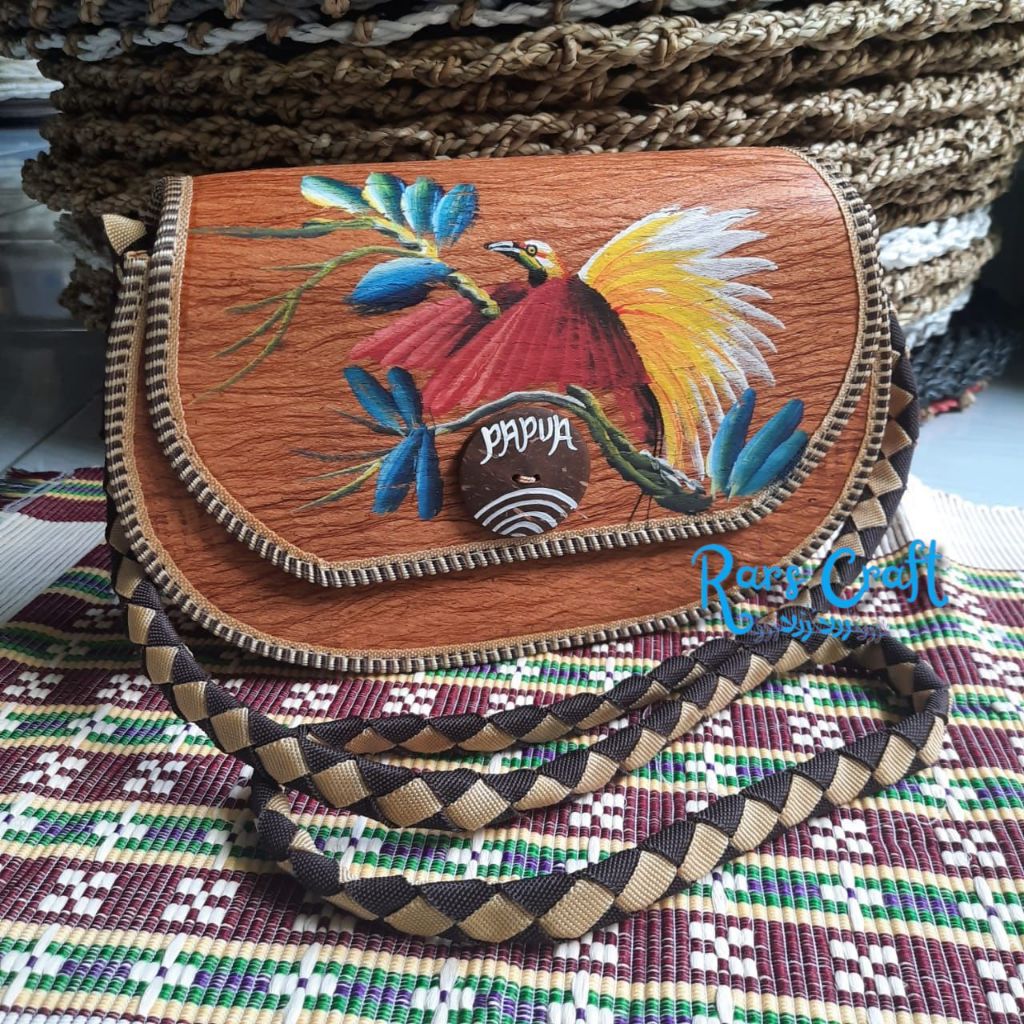 tas kulit khas papua, tas papua, tas selempang wanita, sling bag unik, tas selempang unik, tas selem