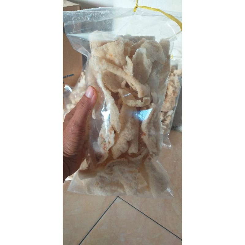 

KERUPUK TUMPI (SUDAH DI GORENG) 100g