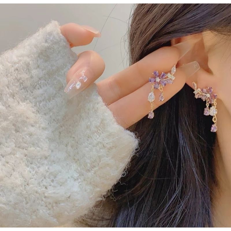 A134 anting rumbai motif bunga anggrek