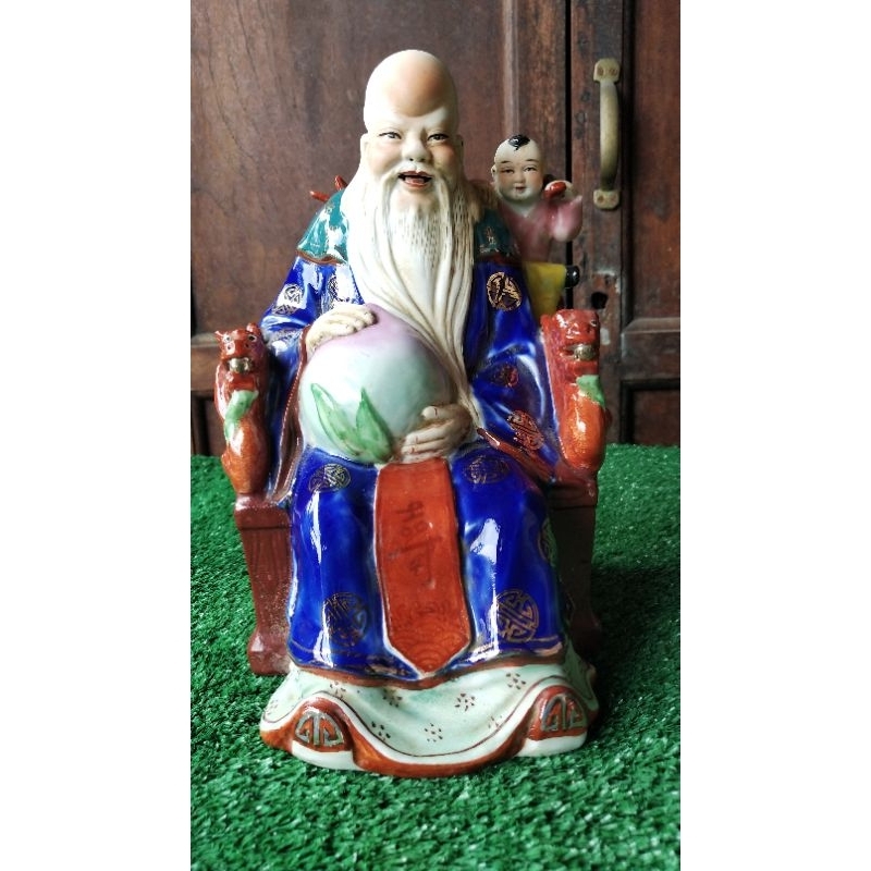 patung cina orang tua 1920