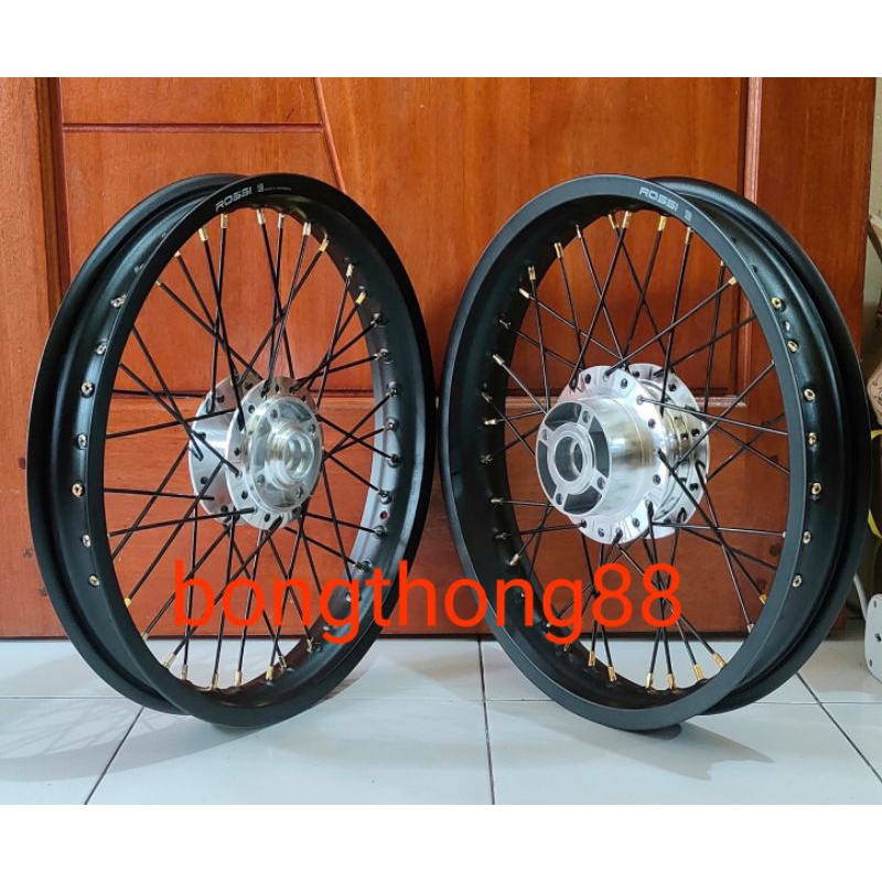 Sepaket Velg Rossi 185 215 17  Supra x125 depan cakram belakang cakram Bonus Rakit
