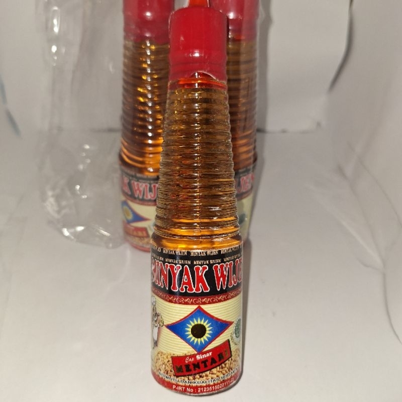 

MINYAK WIJEN cap SINAR MENTARI botol