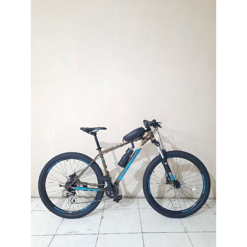 Polygon PREMIER 4 COKELAT BIRU TAHUN 2022