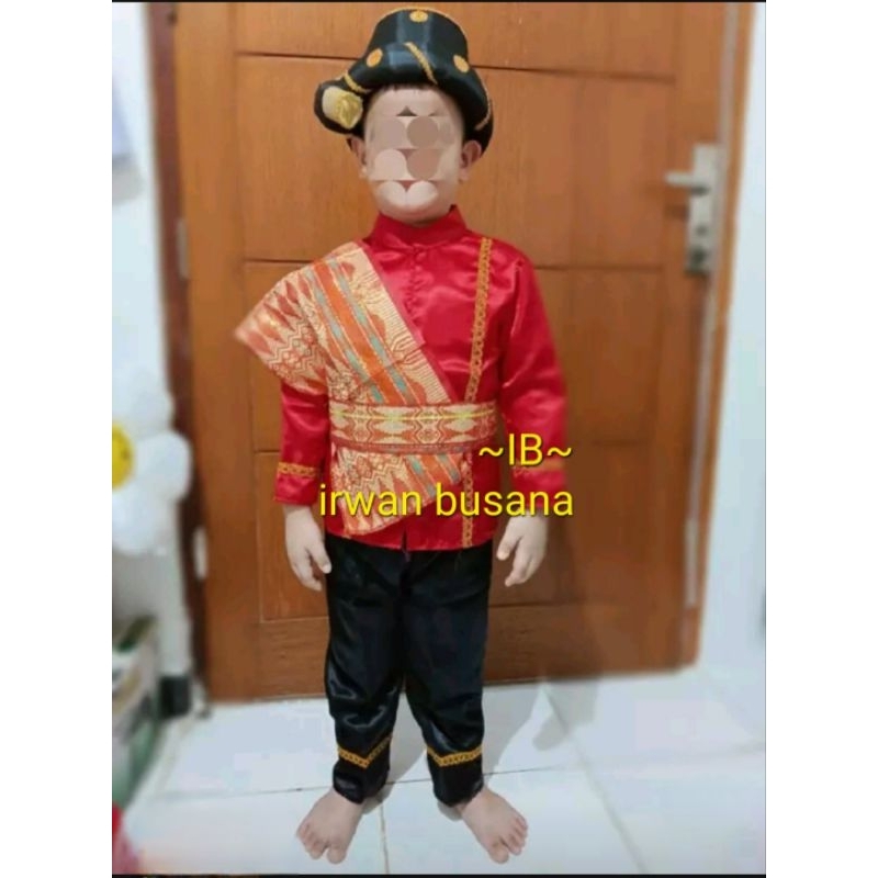 Baju adat batak anak laki