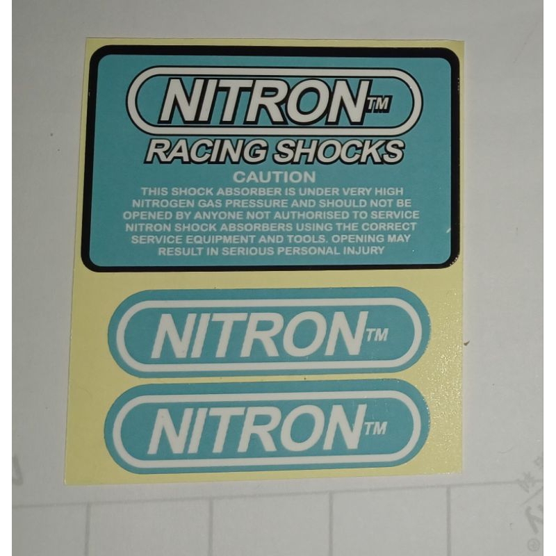 Sticker nitron shock tabung belakang